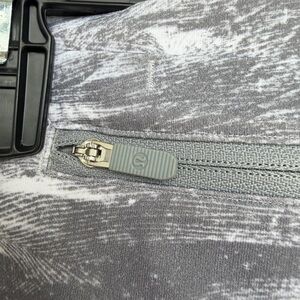 lululemon woman’s Gray Athletic leggings - Zip Pull Detail